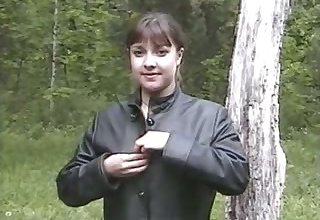 Lewd plump MILF exposes her tits and gets ready upon pee outdoors